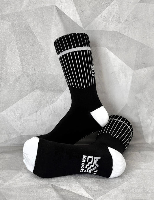 Knookz hemp socks – black and white striped design on gray background
