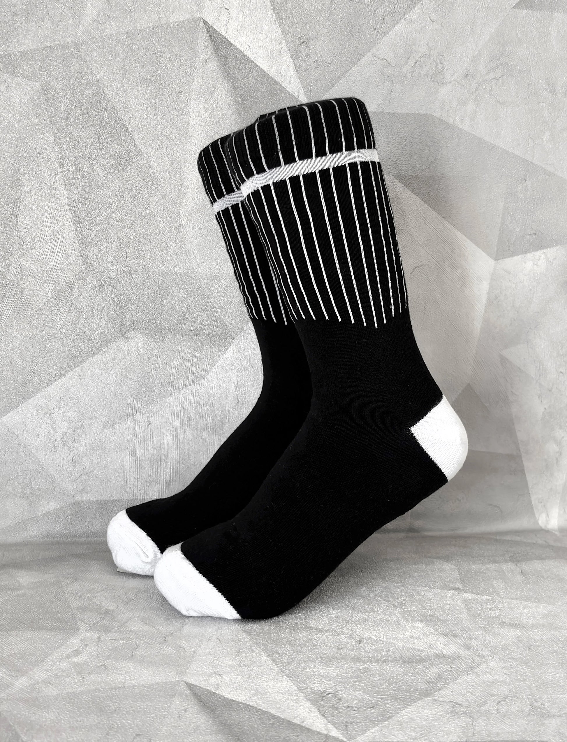Knookz hemp socks – black and white striped design on gray background